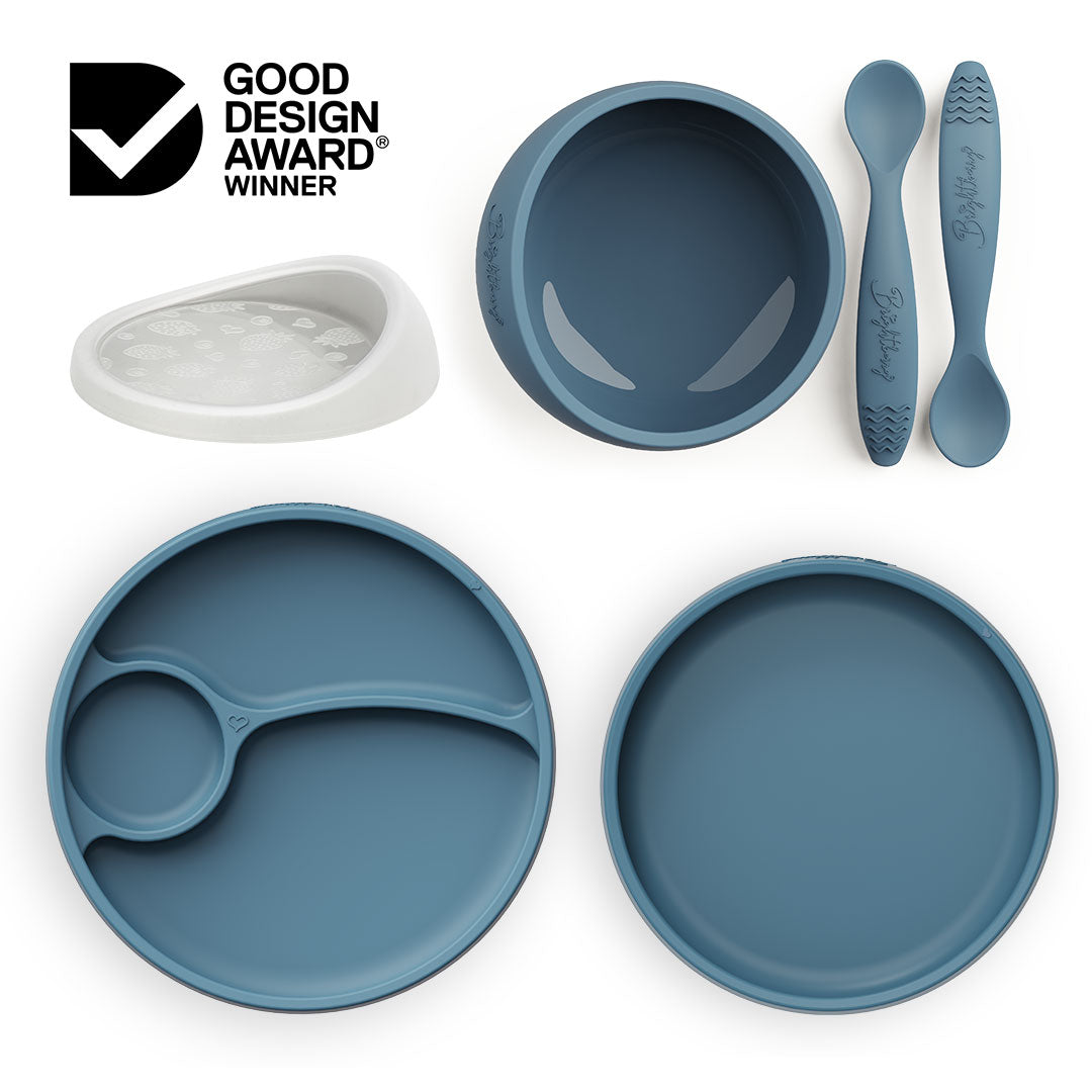 Brightberry Australia by Design Feeding Set in blueberry blue, featuring a suction bowl with a new airtight lid, divided and non-divided plates, and two ergonomic spoons, now gift-packed and award-winning. As seen on Channel 10's Australia by Design: Innovations.