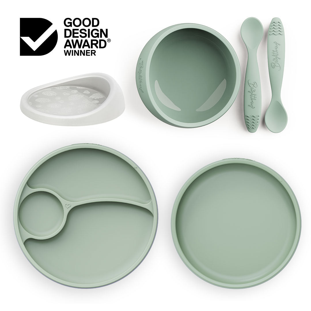 Brightberry Australia by Design Feeding Set in sage green, featuring a suction bowl with a new airtight lid, divided and non-divided plates, and two ergonomic spoons, now gift-packed and award-winning. As seen on Channel 10's Australia by Design: Innovations.