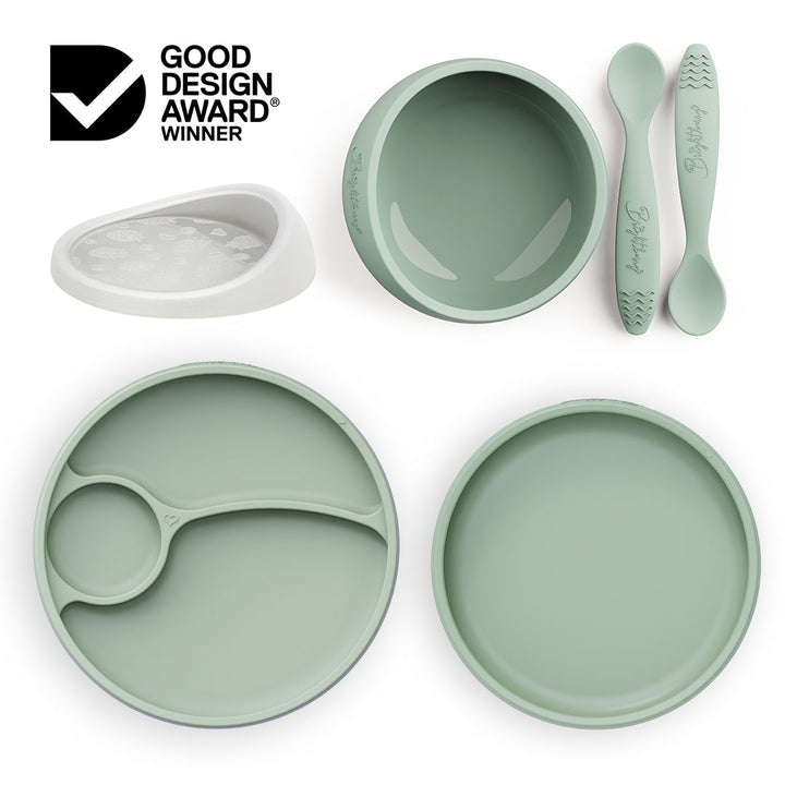 Brightberry Australia by Design Feeding Set in sage green, featuring a suction bowl with a new airtight lid, divided and non-divided plates, and two ergonomic spoons, now gift-packed and award-winning. As seen on Channel 10's Australia by Design: Innovations.
