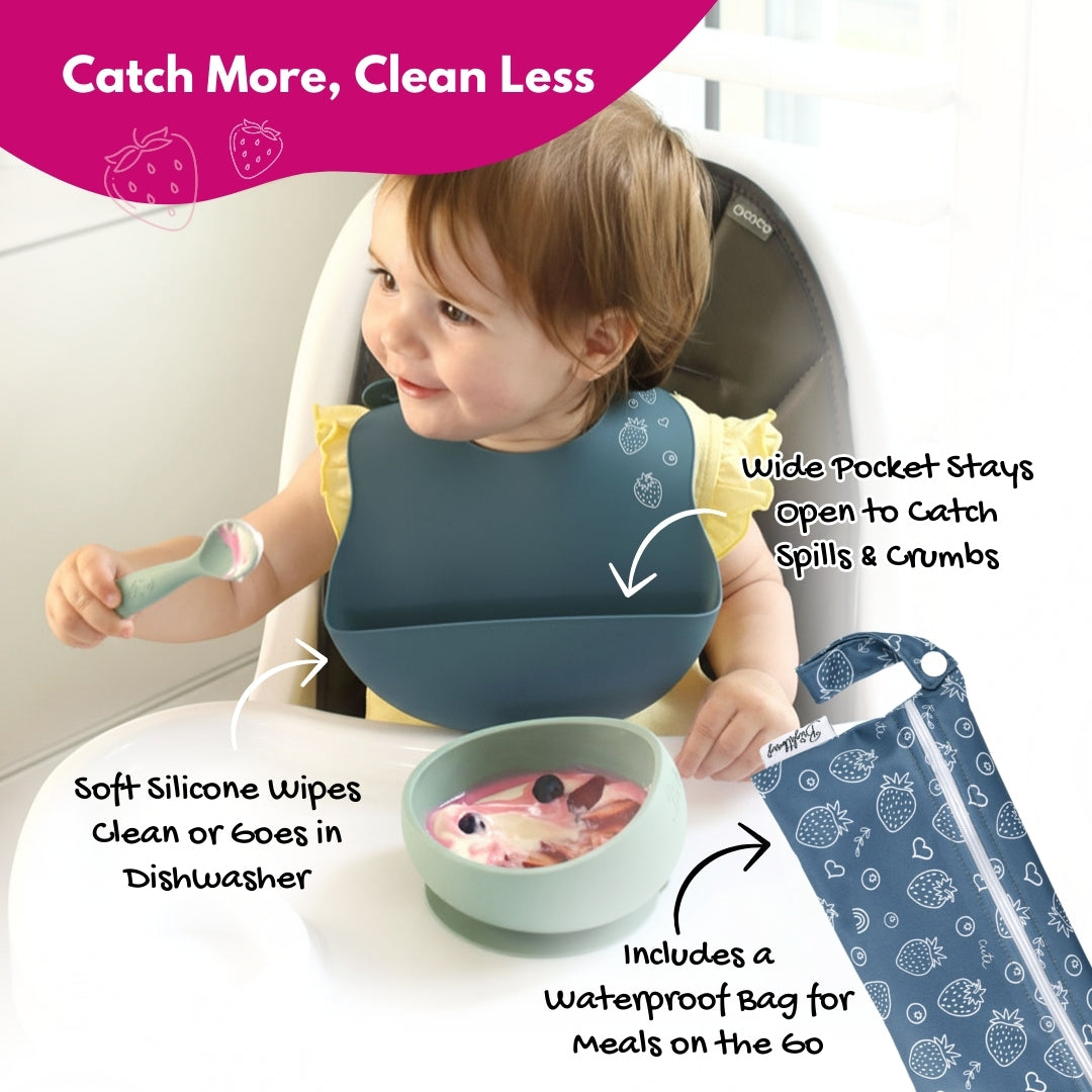 Child using a bib with text highlighting features, including a bowl and waterproof bag.