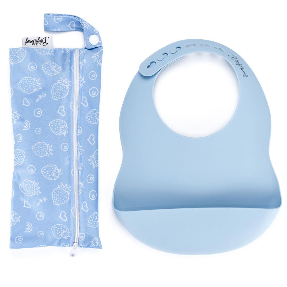 A refreshing pacific light blue silicone pocket bib that can be neatly rolled for storage, presented with its waterproof carry bag featuring a zipper and handle, ensuring hassle-free meals while traveling or eating out.