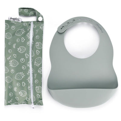 A silicone pocket bib and its waterproof carry bag with a zipper and handle in sage colour, ideal for on-the-go convenience.