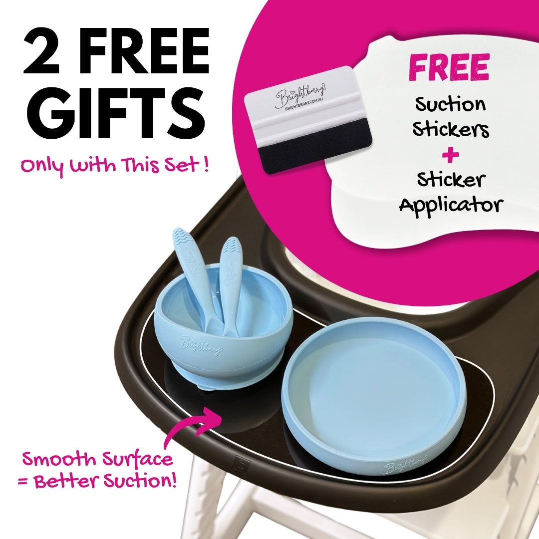 Brightberry High Chair Baby Mealtime Set featuring a suction bowl, plate, and two free gifts — suction stickers and a sticker applicator — shown on a high chair tray with a smooth surface for better suction.