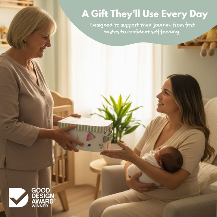 Mum holding a baby, getting a gift from a grandmother