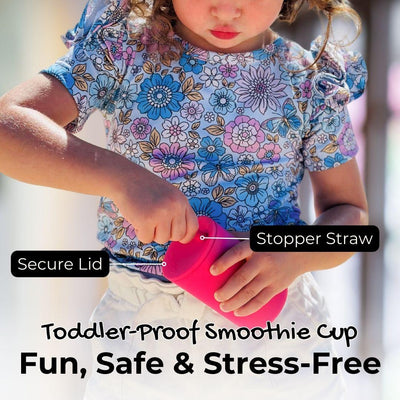 A child securely holding a Brightberry Toddler-Proof Smoothie Cup in pink. The image highlights features such as a 'Secure Lid' and a 'Stopper Straw', emphasizing the product's safety and ease of use. Text overlay states "Toddler-Proof Smoothie Cup Fun, Safe & Stress-Free," suggesting a carefree and enjoyable drinking experience for young children.
