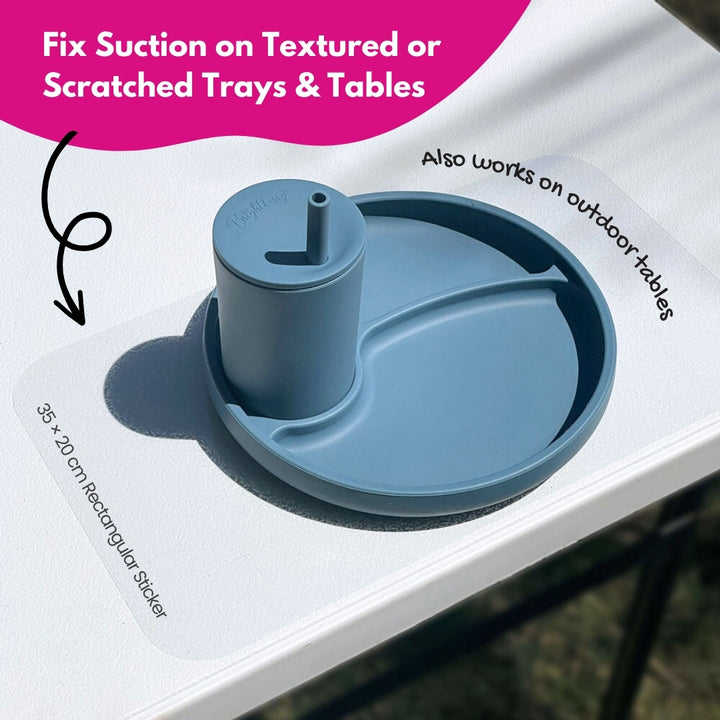 Silicone suction plate placed on a camping table with Brightberry suction sticker creating a smooth surface for stronger grip.