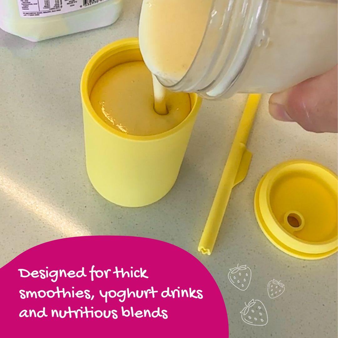 Brightberry yellow silicone smoothie cup being filled with thick smoothie — designed for smoothies, yoghurt drinks and nutritious blends